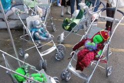 Alien Babies by DuncanCV. Green and silver dollies in children's buggies.